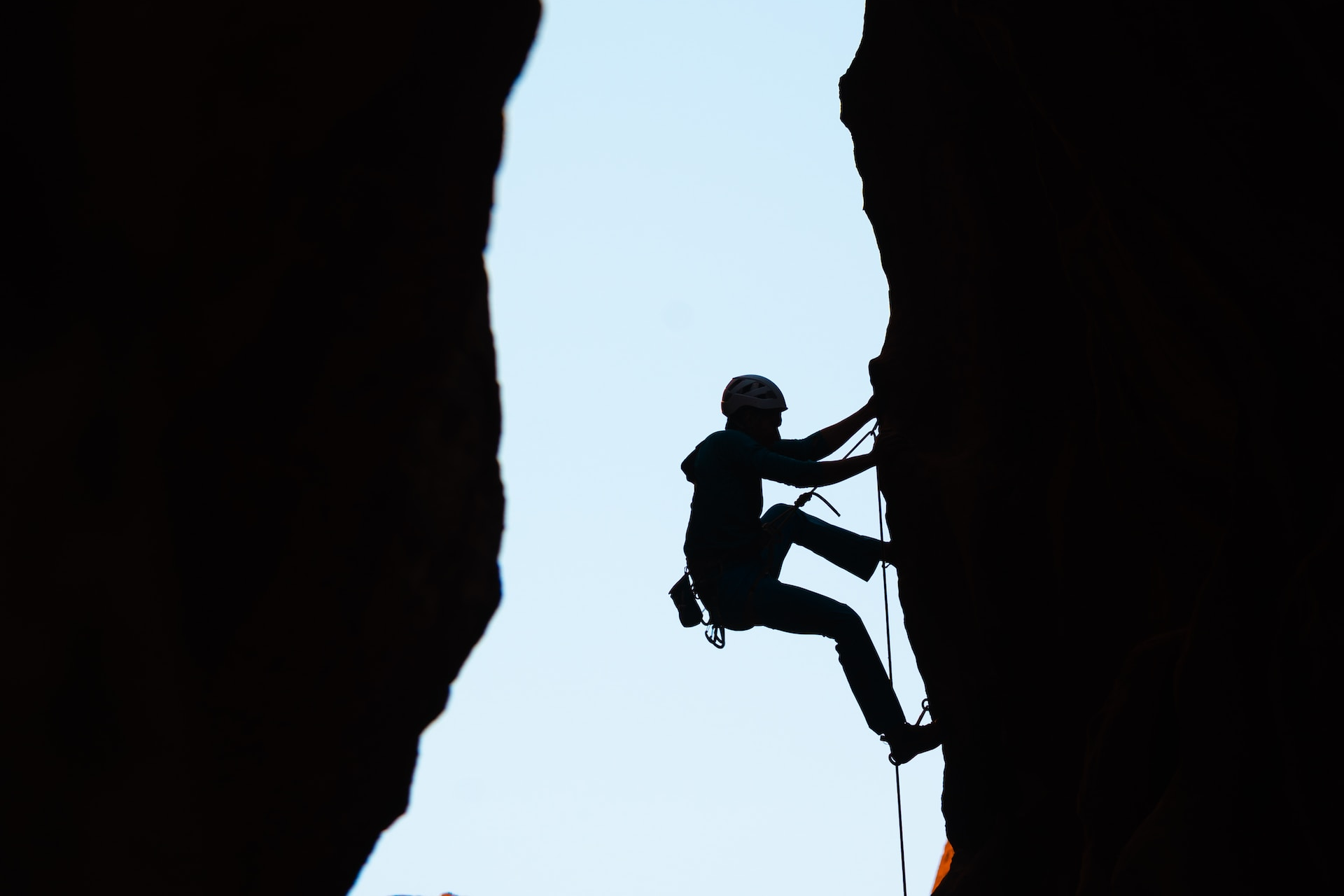 Climber climbing a rock surface